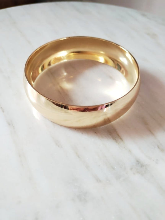 Brazalete Aura Gold – Bold Elegance